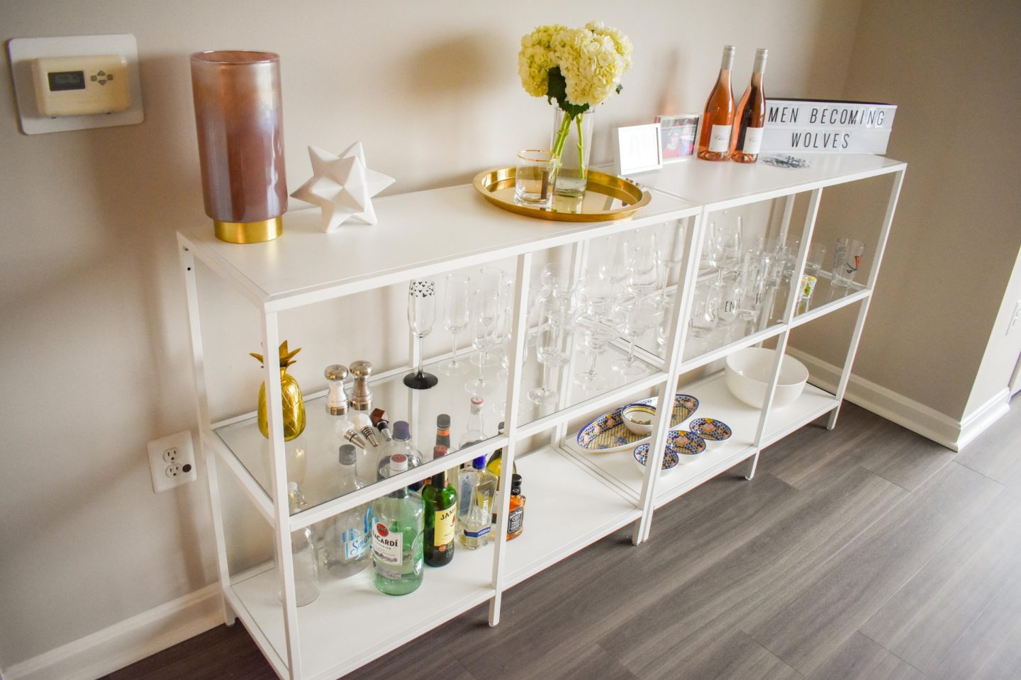 I'm showing off my IKEA bar cart (which are bar shelves, let's be honest) and how I decorated them with all the cute glassware and trinkets!