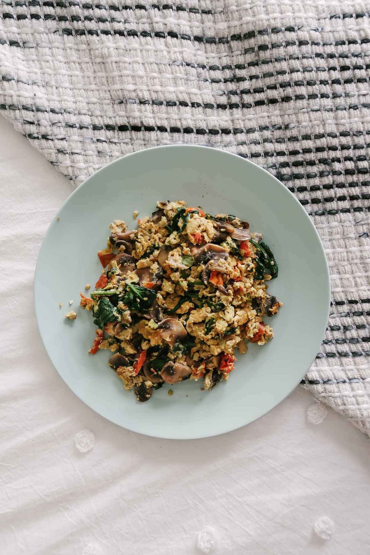 egg scramble with mushrooms, spinach, and tomatoes gabby in the city quarantine 2020